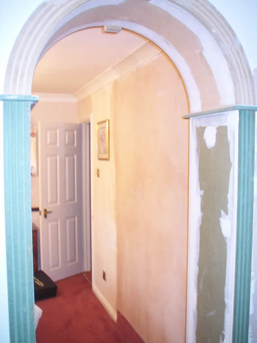 archway by wall panelling